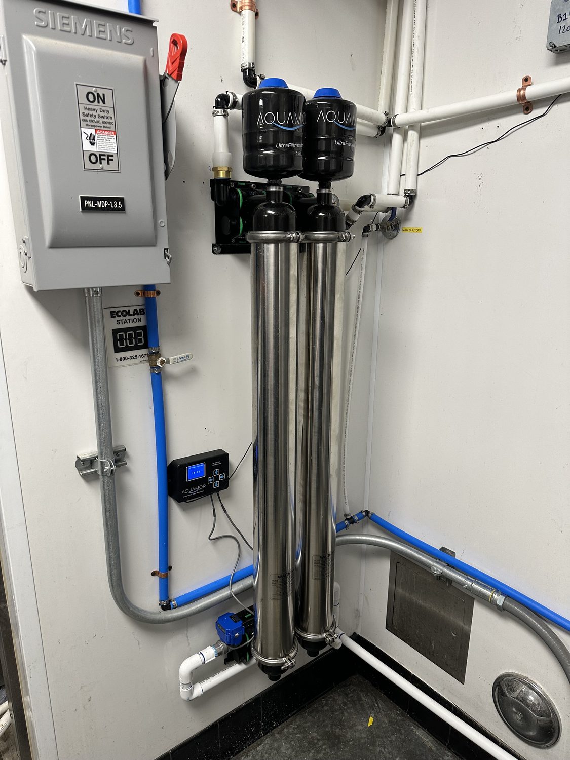 Aquamor commercial filtration system installed and mounted