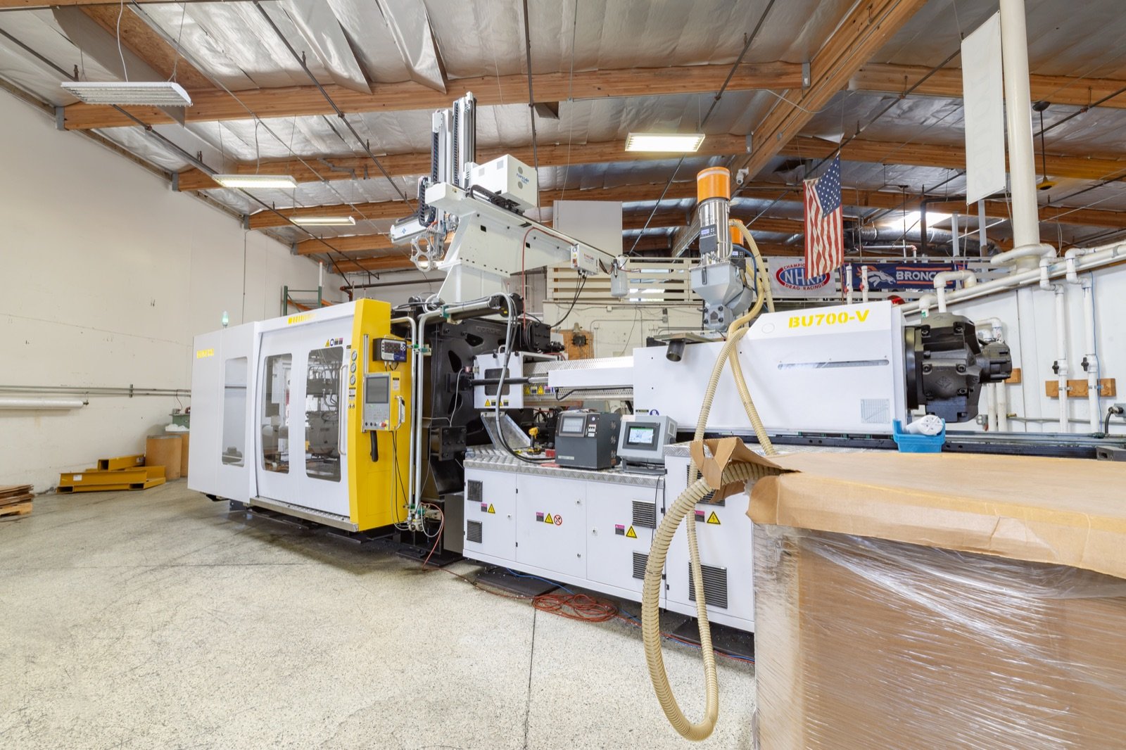 An Aquamor injection-molding machine running on the Temecula, California production floor